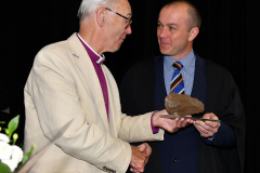 Alan Norton receives the Harper Award from Archbishop Alan Harper in Dundalk Grammar School. Picture Ken Finegan/Newspics