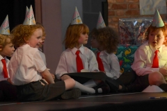 Junior and senior infants look for family members in the audience in the Dundalk Grammar Junior School's production of 'Matilda'.