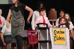 Mary Kate Copas as 'Cook' leaves the chocolate cake for Jack Kieran to eat in the Dundalk Grammar Junior School's production of 'Matilda'.  Photo: Ken Finegan/www.newspics.ie