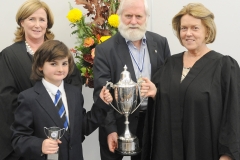 John Sheahan presents the Marie Claire McGovern Cup for Music to Cian Gogan, with Teacher, Pamela O'Connor Moneley and Elaine Lait, Principal, Dundalk Grammar Junior School at the prize day in Dundalk Grammar Junior School.