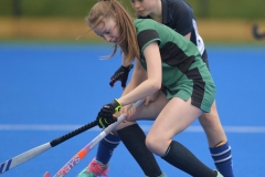 Cora Donnelly, Boyne attempts to hold off a strong challenge from Rose Clarke, DGS at the official opening of the new hockey pitch in Dundalk Grammar School. Photo: Ken Finegan/www.newspics.ie