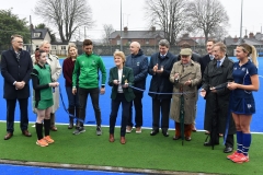 Ann Rosa, President of Hockey Ireland cuts the ribbon held by captains Natasha Swan and Aoife Daly, watched by headmaster Jonathan Graham (Left), Trevor Watkins, Chairman Hockey Ireland, Shane O'Donoghue, Irish International, Peter Fitzpatrick, Chairman of the Louth County Board and members of the DGS board of governors at the official opening of the new hockey pitch in Dundalk Grammar School. Photo: Ken Finegan/www.newspics.ie
