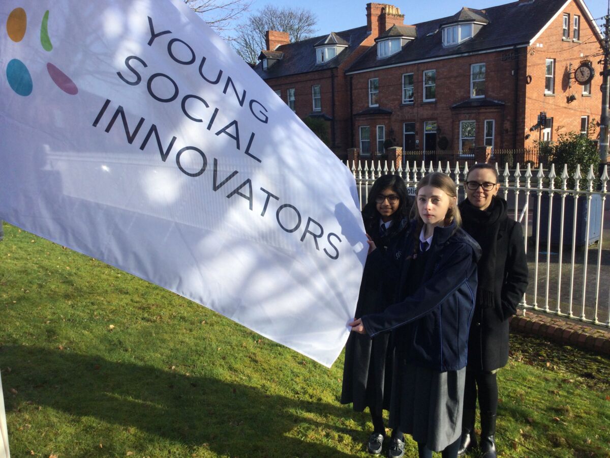 YSI School of Excellence Flag raised in DGS